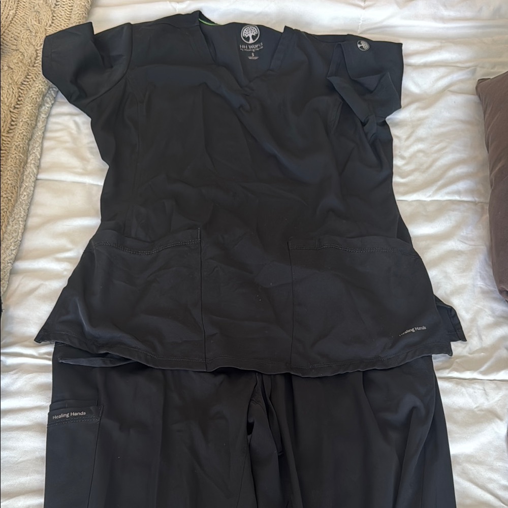 Healing Hands Black Jumpsuit with Sleek Design